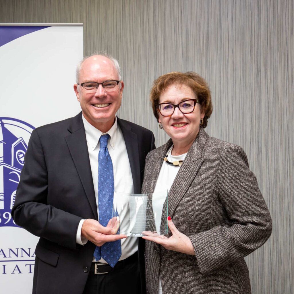 Kate Dempsey Jones receives award from the Lackawanna Bar Association.