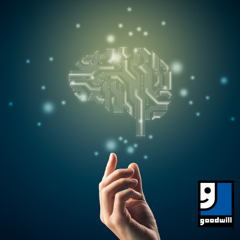 Image of a brain outline and a hand holding the brain outline